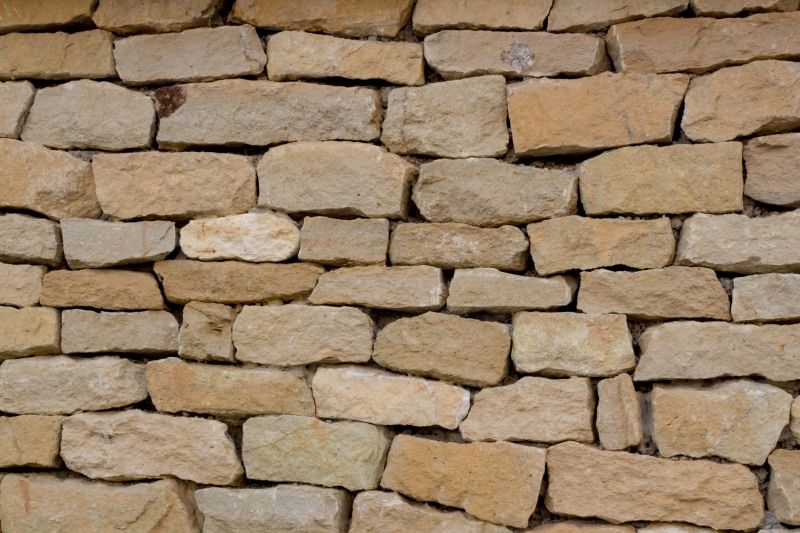 Brick Walls Vs. Stone Walls: Choosing The Right Material